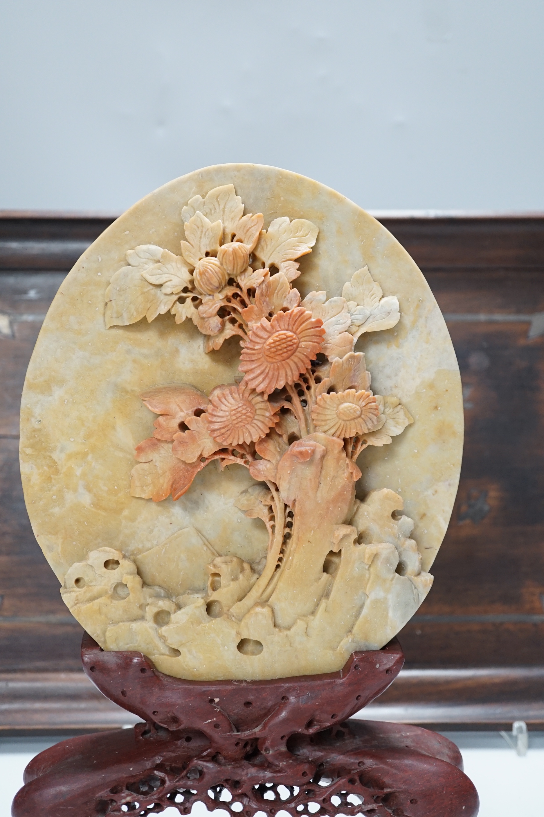 A Chinese white metal wall mounted hongmu tray and a Chinese carved soapstone table screen on stand, tray 44cm x 29.5cm